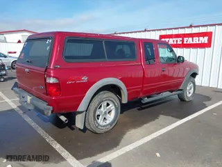 2003 Ford Ranger XL Fleet with VIN 1FTZR45E03PB60352, listed as a IAAI auction lot 41866921 with 85,836 mi miles. Bid and sale history available at carsss.com. Image 4.