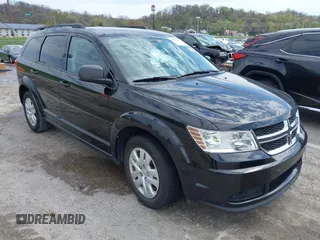 2015 Dodge Journey American Value z VIN 3C4PDCAB7FT649942, wystawiony jako IAAI lot #41984312 z przebiegiem 139 897 mil mil oraz . Historia ofert i sprzedaży dostępna na DreamBid. Obrazek 1.