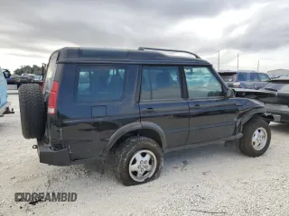 2000 Land Rover Discovery Cloth with VIN SALTY1543YA277439, listed as a Copart auction lot 77599494 with Not Provided miles and Salvage Title. Bid and sale history available at DreamBid. Image 3.