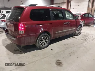 2014 Kia Sedona EX with VIN KNDMH4C74E6547870, listed as a IAAI auction lot 41403040 with 156,005 mi miles. Bid and sale history available at carsss.com. Image 4.