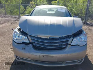 2009 Chrysler Sebring Limited z VIN 1C3LC56V29N561843, wystawiony jako IAAI lot #42286794 z przebiegiem 60 182 mil mil oraz . Historia ofert i sprzedaży dostępna na DreamBid. Obrazek 13.