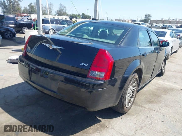 2007 Chrysler 300 with VIN 2C3KA43R97H889656, listed as a IAAI auction lot 41982493 with 81,607 mi miles. Bid and sale history available at carsss.com. Image 4.