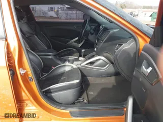2015 Hyundai Veloster Turbo with VIN KMHTC6AE5FU240790, listed as a IAAI auction lot 41497795 with 180,601 mi miles. Bid and sale history available at carsss.com. Image 5.