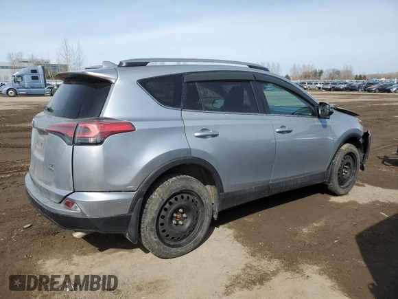 2018 Toyota RAV4 LE with VIN 2T3BFREV9JW754527, listed as a Copart auction lot 48119415 with 217,777 mi miles and Salvage Title. Bid and sale history available at carsss.com. Image 3.