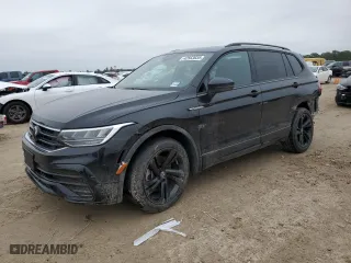 2023 Volkswagen Tiguan SE R-Line Black with VIN 3VVCB7AX1PM122483, listed as a Copart auction lot 42563035 with 22,054 mi miles and Salvage Title. Bid and sale history available at carsss.com. Image 1.