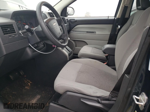 2007 Jeep Compass Sport with VIN 1J8FT470X7D261453, listed as a Copart auction lot 81710234 with 174,118 mi miles and Salvage Title. Bid and sale history available at carsss.com. Image 7.