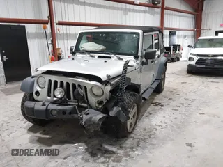 2008 Jeep Wrangler Unlimited X with VIN 1J4GA391X8L647311, listed as a IAAI auction lot 41499620 with 140,601 mi miles and . Bid and sale history available at carsss.com. Image 17.
