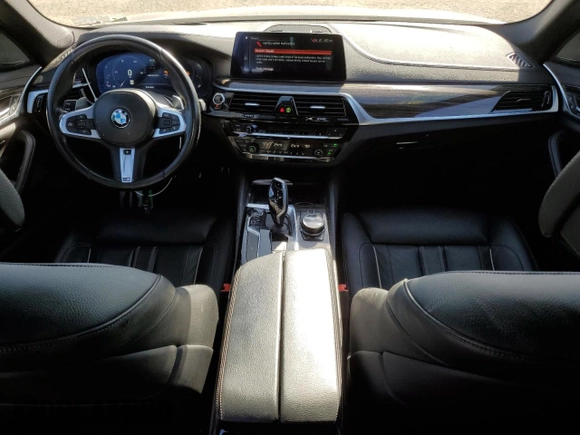 2019 BMW 5 Series M550i xDrive with VIN WBAJB9C50KB464503, listed as a Copart auction lot 56995825 with 67,324 mi miles and Salvage title. Bid and sale history available at DreamBid. Image 8.