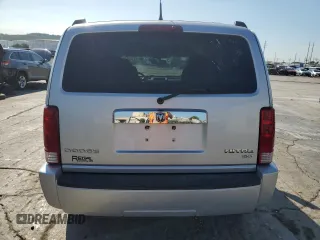 2011 Dodge Nitro SXT z VIN 1D4PT5GK5BW541154, wystawiony jako Copart lot #72741154 z przebiegiem 154 746 mil mil oraz Szkoda całkowita • Salvage title. Historia ofert i sprzedaży dostępna na DreamBid. Obrazek 6.
