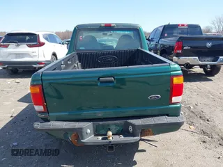 1999 Ford Ranger XL with VIN 1FTYR10C1XPB95732, listed as a IAAI auction lot 41802544 with 135,963 mi miles. Bid and sale history available at carsss.com. Image 16.