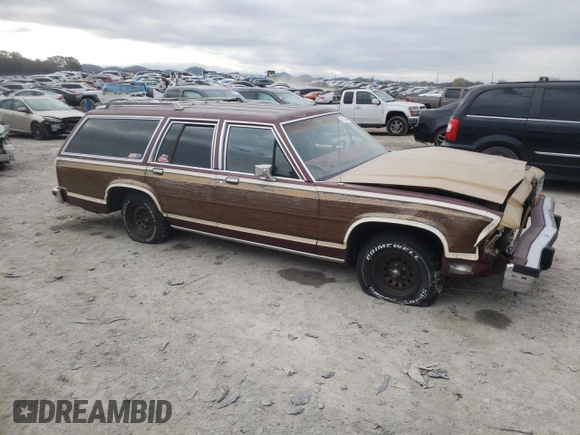 1987 Ford Crown Victoria z VIN 2FABP79F7HX228617, wystawiony jako Copart lot #82165434 z przebiegiem 99 456 mil mil oraz Szkody całkowita. Historia ofert i sprzedaży dostępna na DreamBid. Obrazek 4.