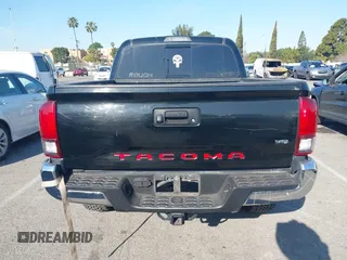 2019 Toyota Tacoma SR z VIN 5TFCZ5AN9KX199814, wystawiony jako IAAI lot #41841821 z przebiegiem 69 276 mil mil oraz . Historia ofert i sprzedaży dostępna na DreamBid. Obrazek 16.