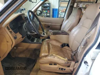 1996 Ford Explorer XL with VIN 1FMDU32X6TUD64045, listed as a Copart auction lot 65942264 with 138,750 mi miles and Salvage title. Bid and sale history available at DreamBid. Image 7.