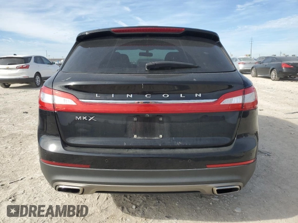 2016 Lincoln MKX Premiere with VIN 2LMTJ6JRXGBL66258, listed as a Copart auction lot 82767574 with 111,127 mi miles and Salvage Title. Bid and sale history available at carsss.com. Image 6.