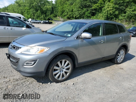 2010 Mazda CX-9 Touring z VIN JM3TB3MV6A0236465, wystawiony jako Copart lot #61902095 z przebiegiem 185 741 mil mil oraz Czysty tytuł • Clean title. Historia ofert i sprzedaży dostępna na DreamBid. Obrazek 1.