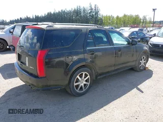 2004 Cadillac SRX with VIN 1GYEE63A540181451, listed as a IAAI auction lot 42090171 with 232,270 mi miles. Bid and sale history available at carsss.com. Image 4.