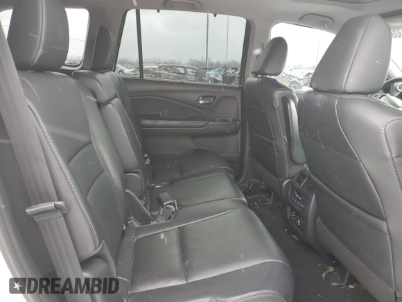 2018 Honda Pilot Touring z VIN 5FNYF6H99JB028034, wystawiony jako Copart lot #45143085 z przebiegiem 70 060 mil mil oraz Szkoda całkowita • Salvage title. Historia ofert i sprzedaży dostępna na DreamBid. Obrazek 11.