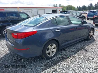 2015 Kia Optima LX z VIN KNAGM4A74F5590332, wystawiony jako IAAI lot #42304364 z przebiegiem 131 720 mil mil oraz . Historia ofert i sprzedaży dostępna na DreamBid. Obrazek 4.