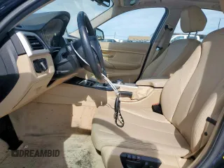 2015 BMW 3 Series 320i with VIN WBA3B1C58FK140327, listed as a Copart auction lot 57999675 with 124,437 mi miles and Salvage title. Bid and sale history available at DreamBid. Image 7.