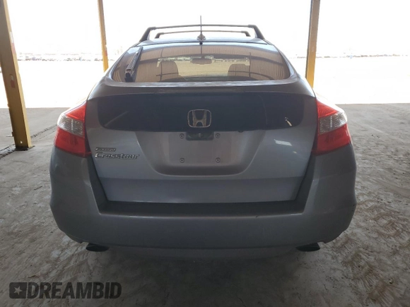 2010 Honda Crosstour EX-L z VIN 5J6TF1H51AL012556, wystawiony jako Copart lot #58065735 z przebiegiem 170 528 mil mil oraz Szkoda całkowita • Salvage title. Historia ofert i sprzedaży dostępna na DreamBid. Obrazek 6.