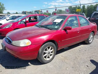 2000 Ford Contour SE Fleet z VIN 1FAFP66L2YK119281, wystawiony jako IAAI lot #42797519 z przebiegiem 46 808 mil mil oraz . Historia ofert i sprzedaży dostępna na DreamBid. Obrazek 2.