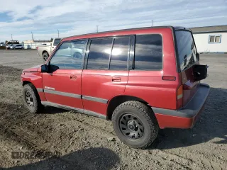1995 Suzuki Sidekick z VIN JS3TD03V6S4113425, wystawiony jako Copart lot #76973244 z przebiegiem 152 638 mil mil oraz Szkody całkowita. Historia ofert i sprzedaży dostępna na DreamBid. Obrazek 2.