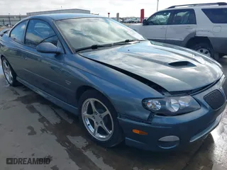 2006 Pontiac GTO with VIN 6G2VX12UX6L561098, listed as a IAAI auction lot 41487635 with 69,741 mi miles. Bid and sale history available at carsss.com. Image 1.