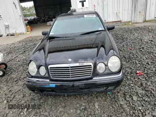 1999 Mercedes-Benz E-Class with VIN WDBJF65H4XA883351, listed as a Copart auction lot 73682964 with 156,446 mi miles and Salvage Title. Bid and sale history available at carsss.com. Image 5.