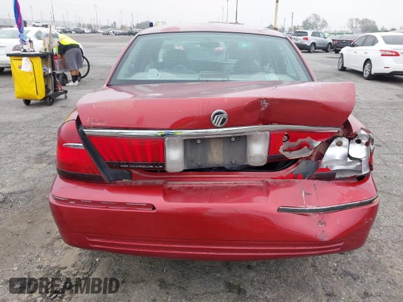 2000 Mercury Grand Marquis LS z VIN 2MEFM75W0YX658319, wystawiony jako IAAI lot #42028736 z przebiegiem 154 651 mil mil oraz . Historia ofert i sprzedaży dostępna na DreamBid. Obrazek 6.