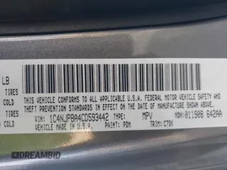 2012 Jeep Patriot Sport with VIN 1C4NJPBA4CD593442, listed as a IAAI auction lot 40906505 with 159,482 mi miles and . Bid and sale history available at DreamBid. Image 9.