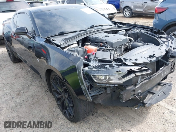 2019 Chevrolet Camaro 1LT z VIN 1G1FA1RX1K0127249, wystawiony jako IAAI lot #42240323 z przebiegiem 69 945 mil mil oraz . Historia ofert i sprzedaży dostępna na DreamBid. Obrazek 1.
