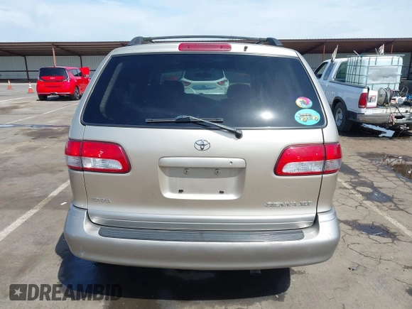 2002 Toyota Sienna LE with VIN 4T3ZF13C32U486822, listed as a IAAI auction lot 42019920 with 212,606 mi miles. Bid and sale history available at carsss.com. Image 16.