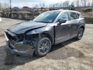 2020 Mazda CX-5 Touring with VIN JM3KFBCM2L1800273, listed as a Copart auction lot 51281055 with 97,692 mi miles and Salvage Title. Bid and sale history available at DreamBid. Image 1.