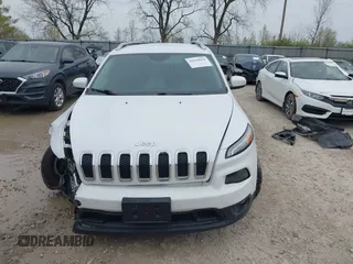 2014 Jeep Cherokee Latitude with VIN 1C4PJMCSXEW150735, listed as a IAAI auction lot 42020944 with 76,303 mi miles and . Bid and sale history available at carsss.com. Image 13.