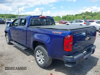 2016 Chevrolet Colorado 4WD LT z VIN 1GCGTCE34G1320047, wystawiony jako IAAI lot #42220317 z przebiegiem 61 897 mil mil oraz . Historia ofert i sprzedaży dostępna na DreamBid. Obrazek 3.
