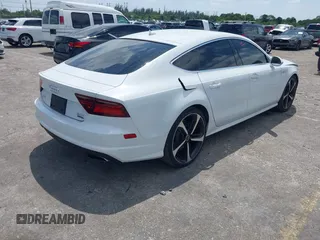 2016 Audi A7 3.0 Prestige with VIN WAU2GAFCXGN102993, listed as a IAAI auction lot 42099259 with 64,490 mi miles. Bid and sale history available at carsss.com. Image 4.