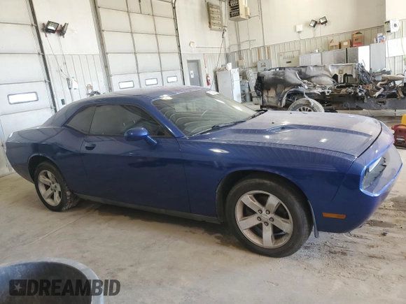 2012 Dodge Challenger SXT Plus with VIN 2C3CDYAG9CH239160, listed as a Copart auction lot 51223635 with 116,546 mi miles and Salvage Title. Bid and sale history available at carsss.com. Image 4.