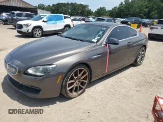 2012 BMW 6 Series 650i z VIN WBALX3C58CC528712, wystawiony jako Copart lot #59771685 z przebiegiem 106 330 mil mil oraz Czysty tytuł • Clean title. Historia ofert i sprzedaży dostępna na DreamBid. Obrazek 1.