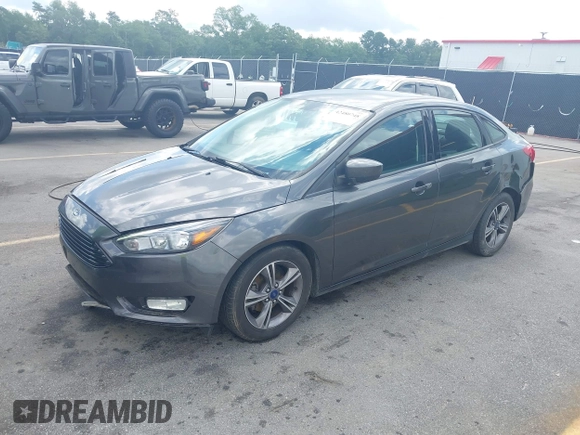 2018 Ford Focus SE with VIN 1FADP3FE2JL263954, listed as a IAAI auction lot 42480748 with 111,059 mi miles and . Bid and sale history available at DreamBid. Image 17.