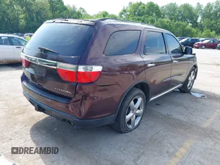 2012 Dodge Durango Citadel with VIN 1C4SDHET1CC275636, listed as a IAAI auction lot 42266742 with 212,030 mi miles and . Bid and sale history available at DreamBid. Image 4.