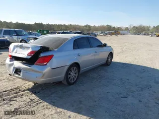 2006 Toyota Avalon XL with VIN 4T1BK36B16U075719, listed as a IAAI auction lot 41831884 with 215,448 mi miles. Bid and sale history available at carsss.com. Image 4.