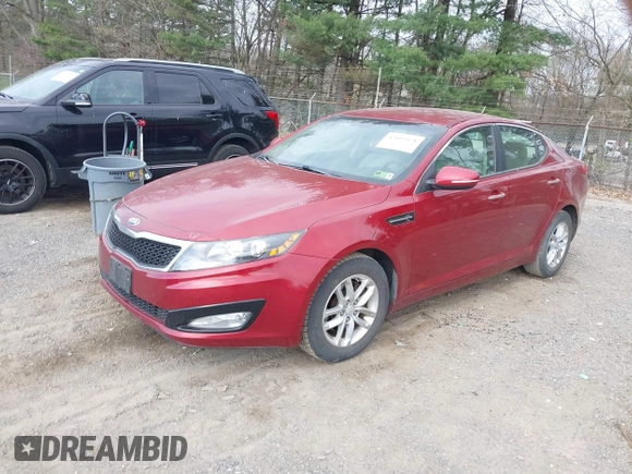 2013 Kia Optima LX with VIN 5XXGM4A75DG112495, listed as a IAAI auction lot 42059578 with 70,115 mi miles. Bid and sale history available at carsss.com. Image 2.