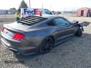 2020 Ford Mustang EcoBoost with VIN 1FA6P8TH7L5159973, listed as a IAAI auction lot 41691692 with 62,365 mi miles. Bid and sale history available at carsss.com. Image 4.