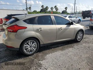 2016 Ford Focus Titanium with VIN 1FADP3N24GL302625, listed as a Copart auction lot 59180675 with 97,401 mi miles and Salvage title. Bid and sale history available at DreamBid. Image 3.