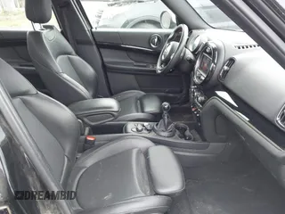 2019 MINI Countryman Cooper S z VIN WMZYT5C5XK3E69664, wystawiony jako IAAI lot #42385669 z przebiegiem 64 761 mil mil oraz . Historia ofert i sprzedaży dostępna na DreamBid. Obrazek 5.