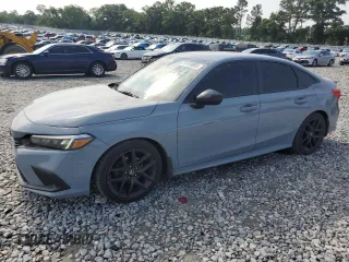 2023 Honda Civic Sport with VIN 2HGFE2F51PH507930, listed as a Copart auction lot 57410855 with 22,648 mi miles and Salvage title. Bid and sale history available at DreamBid. Image 1.