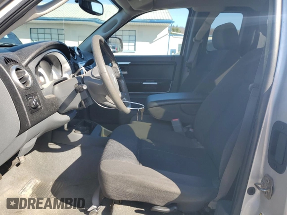 2006 Mitsubishi Raider Duro Cross with VIN 1Z7HT32N06S578928, listed as a Copart auction lot 52421195 with 67,977 mi miles and Clean Title. Bid and sale history available at carsss.com. Image 7.