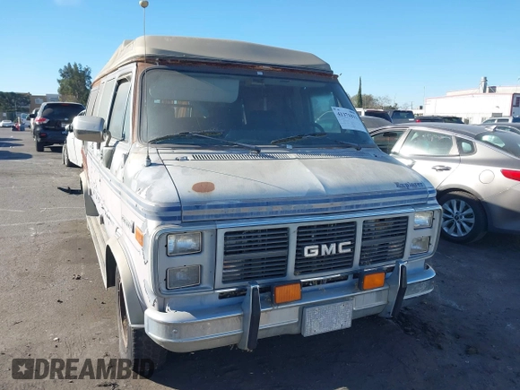 1989 GMC Vandura z VIN 1GDEG25K1K7521984, wystawiony jako IAAI lot #41371811 z przebiegiem 43 502 mil mil oraz . Historia ofert i sprzedaży dostępna na DreamBid. Obrazek 1.