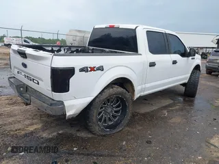 2019 Ford F-150 XL with VIN 1FTEW1EB2KKD98999, listed as a IAAI auction lot 42182839 with 162,098 mi miles and . Bid and sale history available at DreamBid. Image 4.