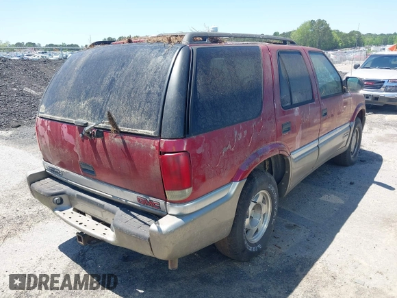 2000 GMC Jimmy SL with VIN 1GKCS13W9Y2264710, listed as a IAAI auction lot 42136082 with 206,584 mi miles. Bid and sale history available at carsss.com. Image 4.
